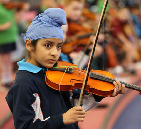 student playing violin